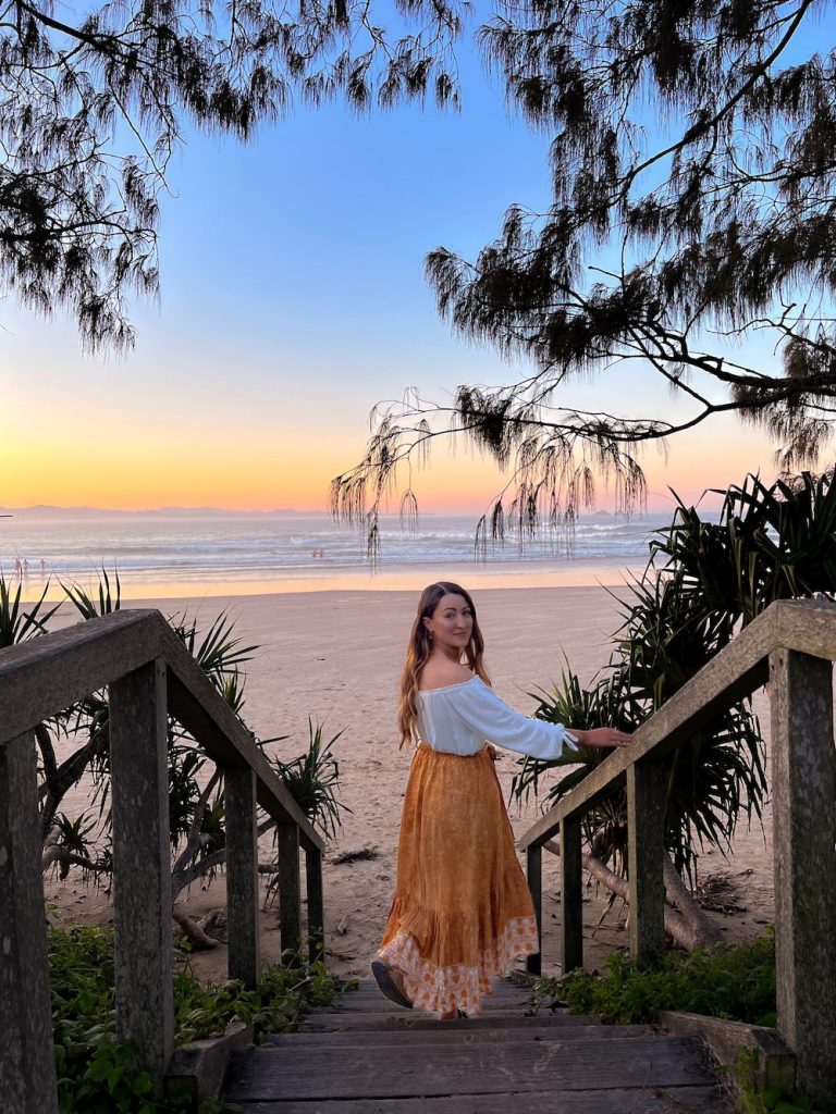 See the beautiful sunset from Wategos Beach - a must-do for travelling to Byron Bay