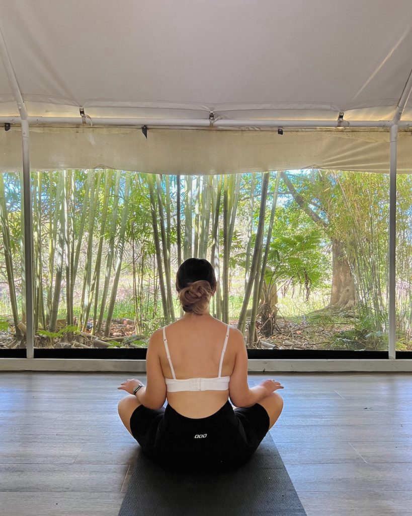 Enjoying the complimentary yoga classes at Wake Up! Byron Bay, in their own yoga studio tent. A must-do!