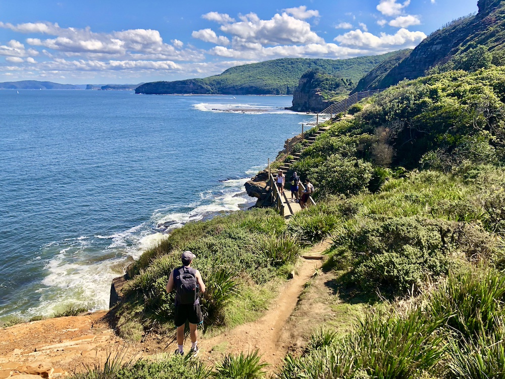 Sydney to Byron Bay road trip inspiration, for a self-drive itinerary for backpackers. Include a stop at Bouddi National Park for incredible views and hiking in nature.