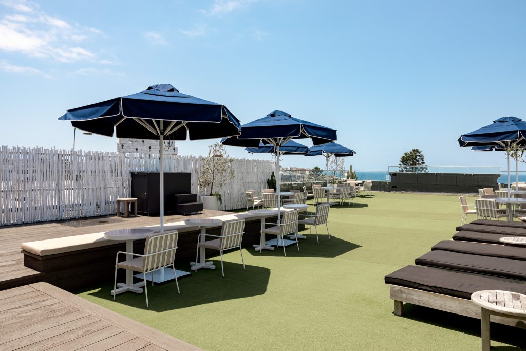 Rooftop area at Wake Up! Bondi Beach. The rooftop is where guests can participate in complimentary yoga classes, and have complimentary access to the ice bath and sauna.